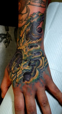 Ty McEwen - bio organic hand tattoo